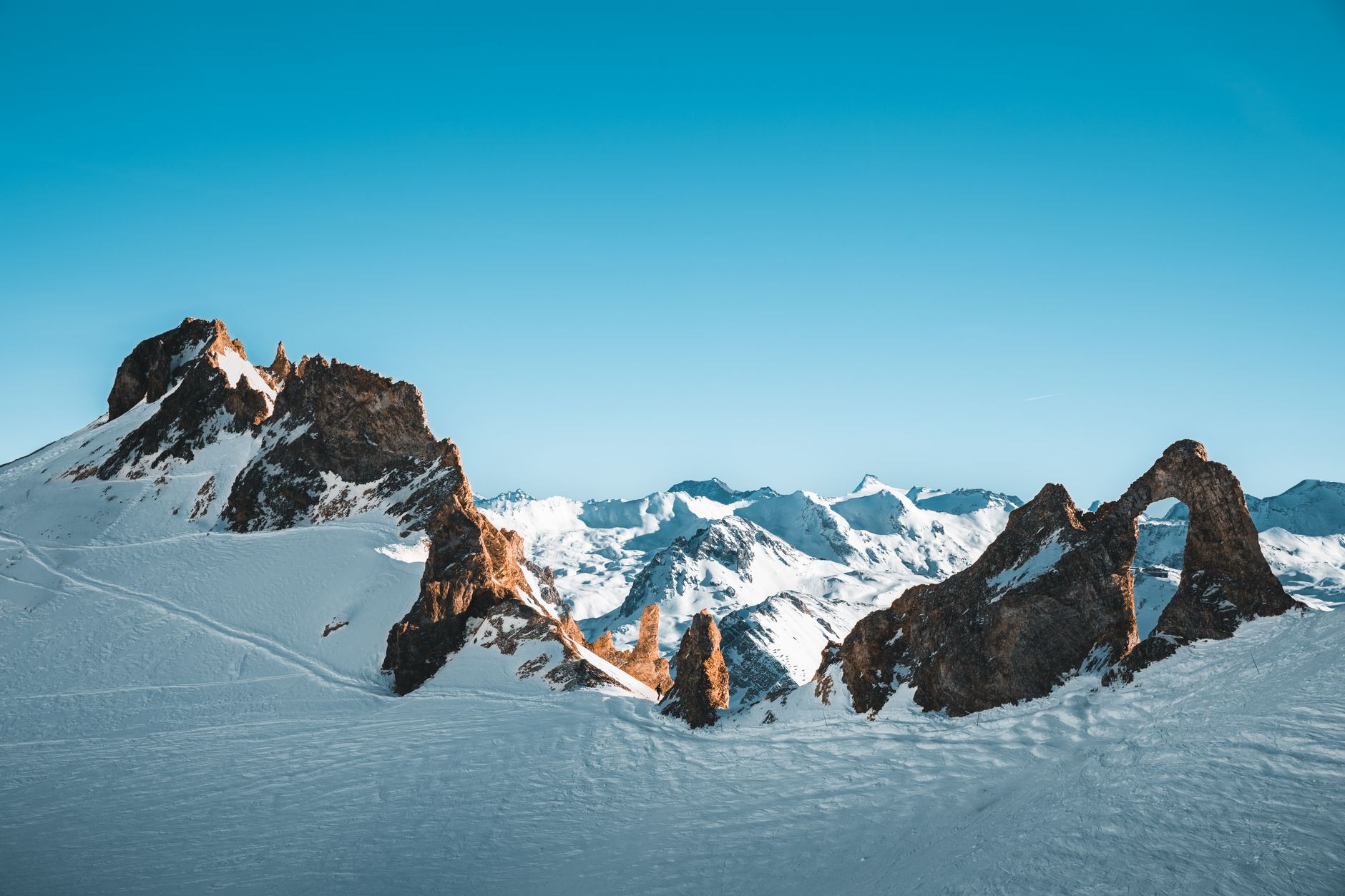 Explore the breathtaking snow-covered mountains of Val-d'Isère, France. — photograph by Ryan Klaus on Pexels